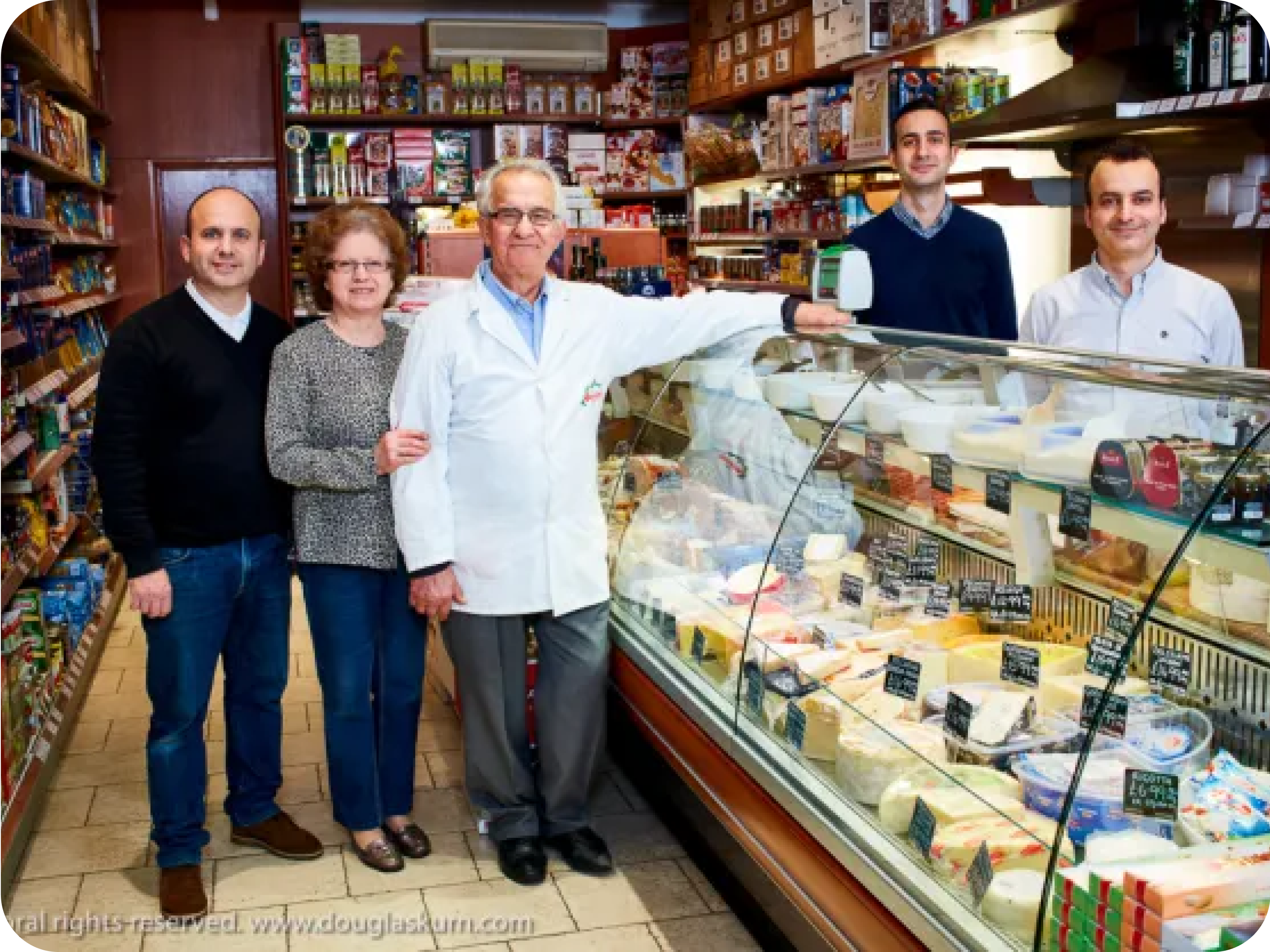 Carlo and family in Carlo Deli